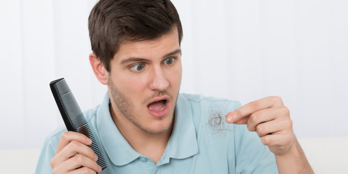 A man with hair shedding