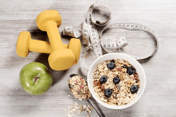foods, weights and a tape measure tools to use with weight loss peptides