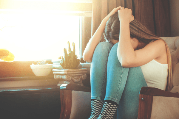 a woman who appears depressed.