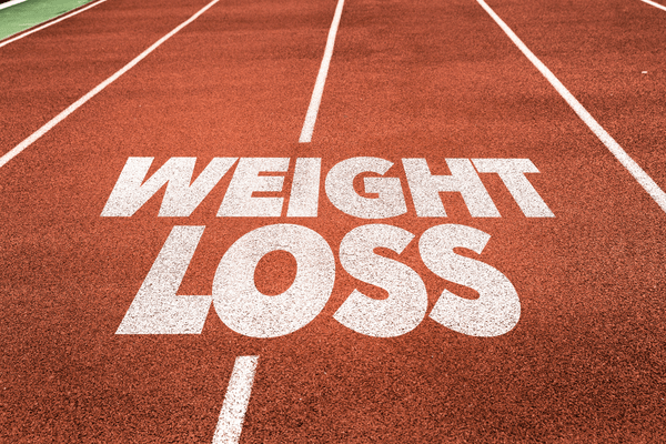 a field with the words "weight loss"