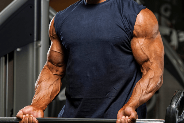 A strong man lifting weights