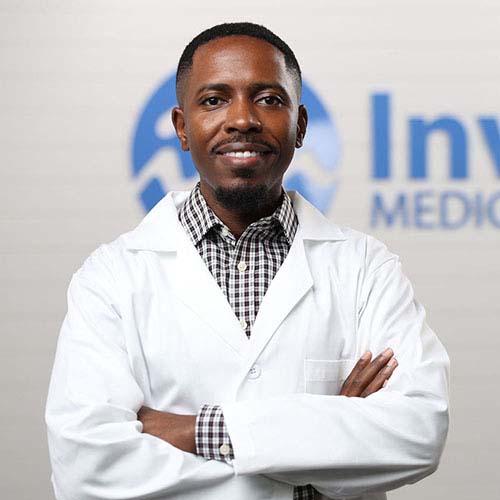 Dr Stephen Jones, Smiling and folding arms