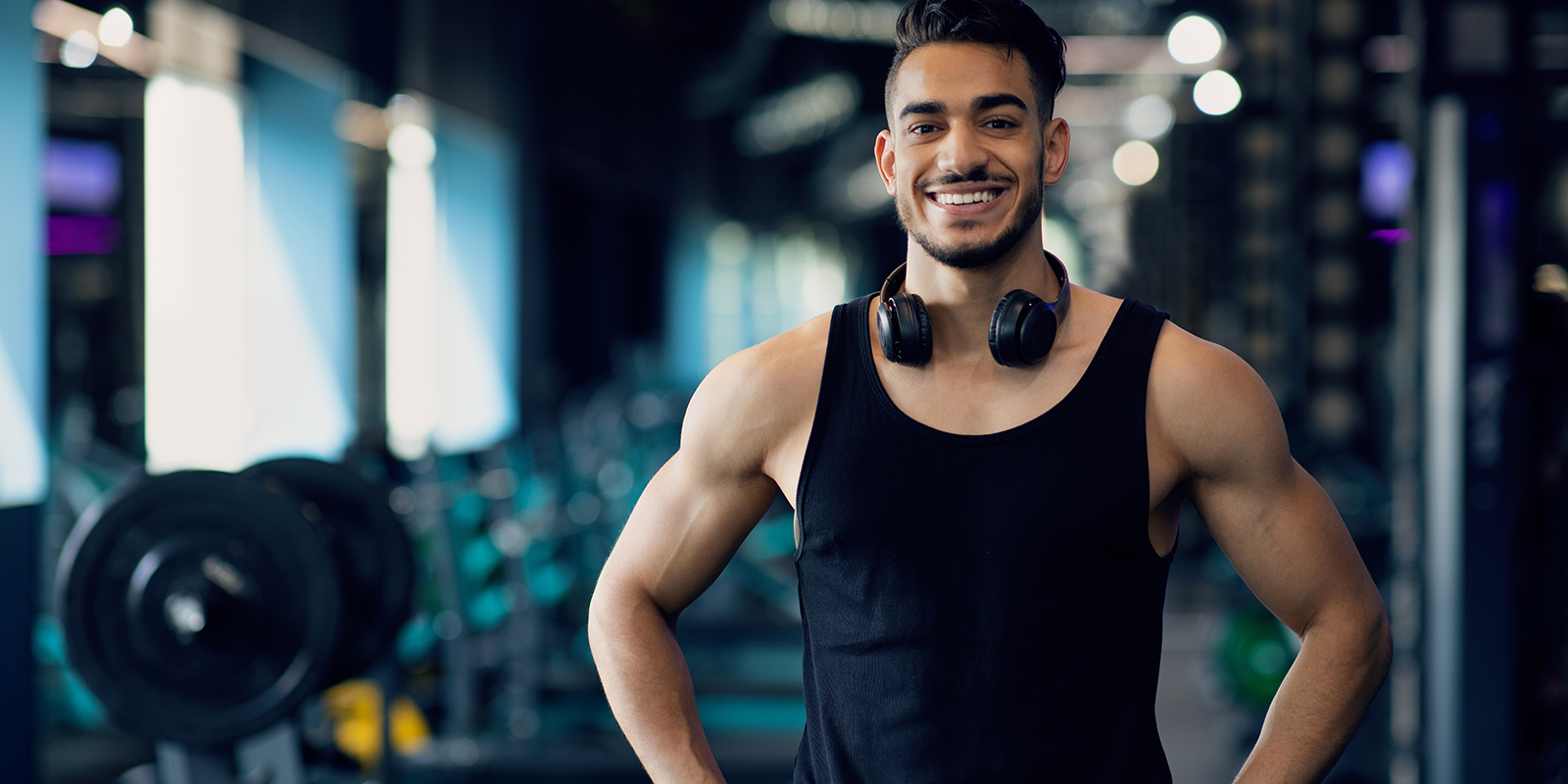 Gymgoers doing a kettlebell exercise together