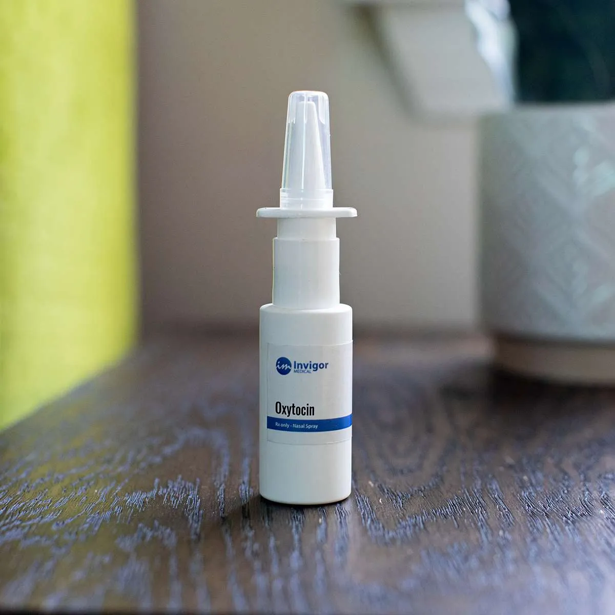 Oxytocin Nasal Spray Medication in Hand