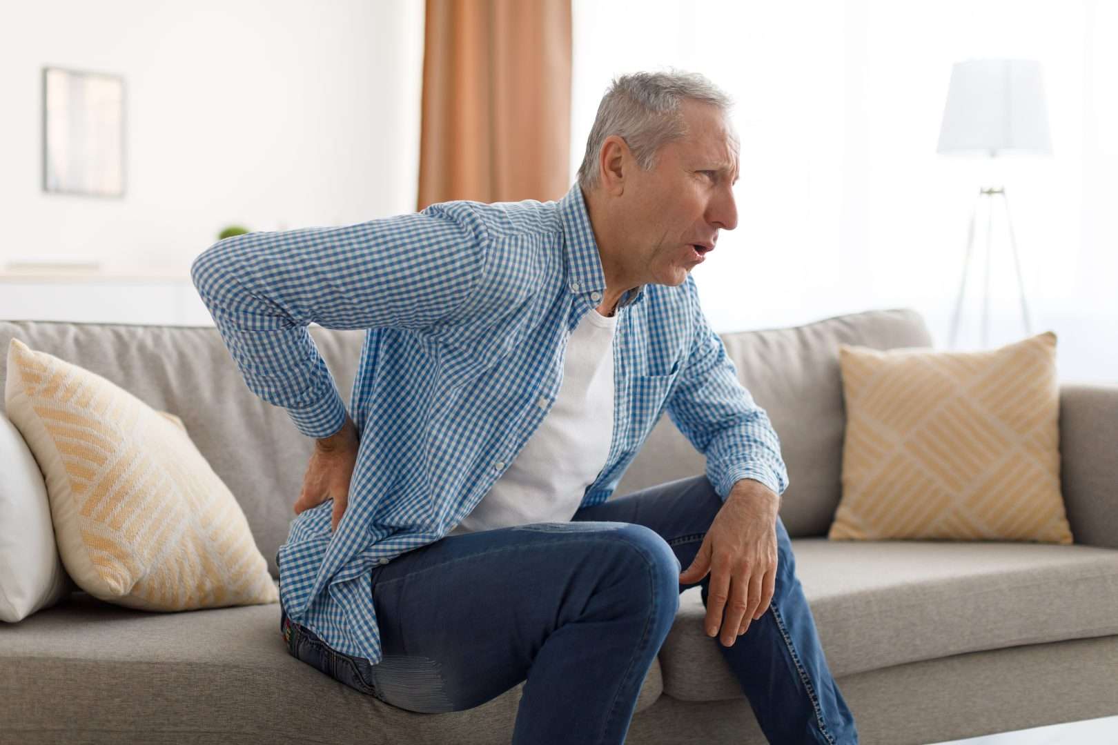 Man suffering from sciatic pain