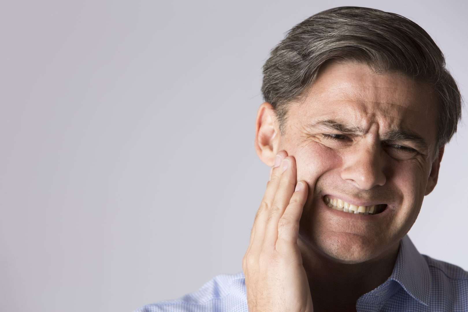 Man having facial pain